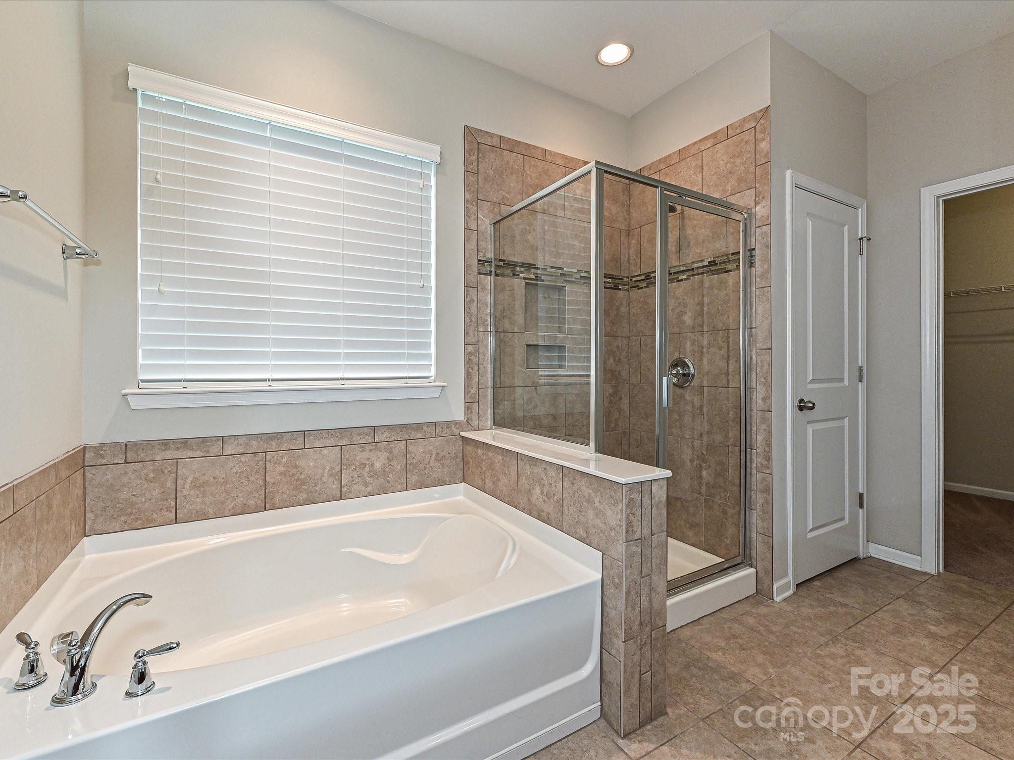 4425 Marlay Park Indian Trail, NC 28079 - Photo 24 of 33 a bathroom with a bathtub and a shower