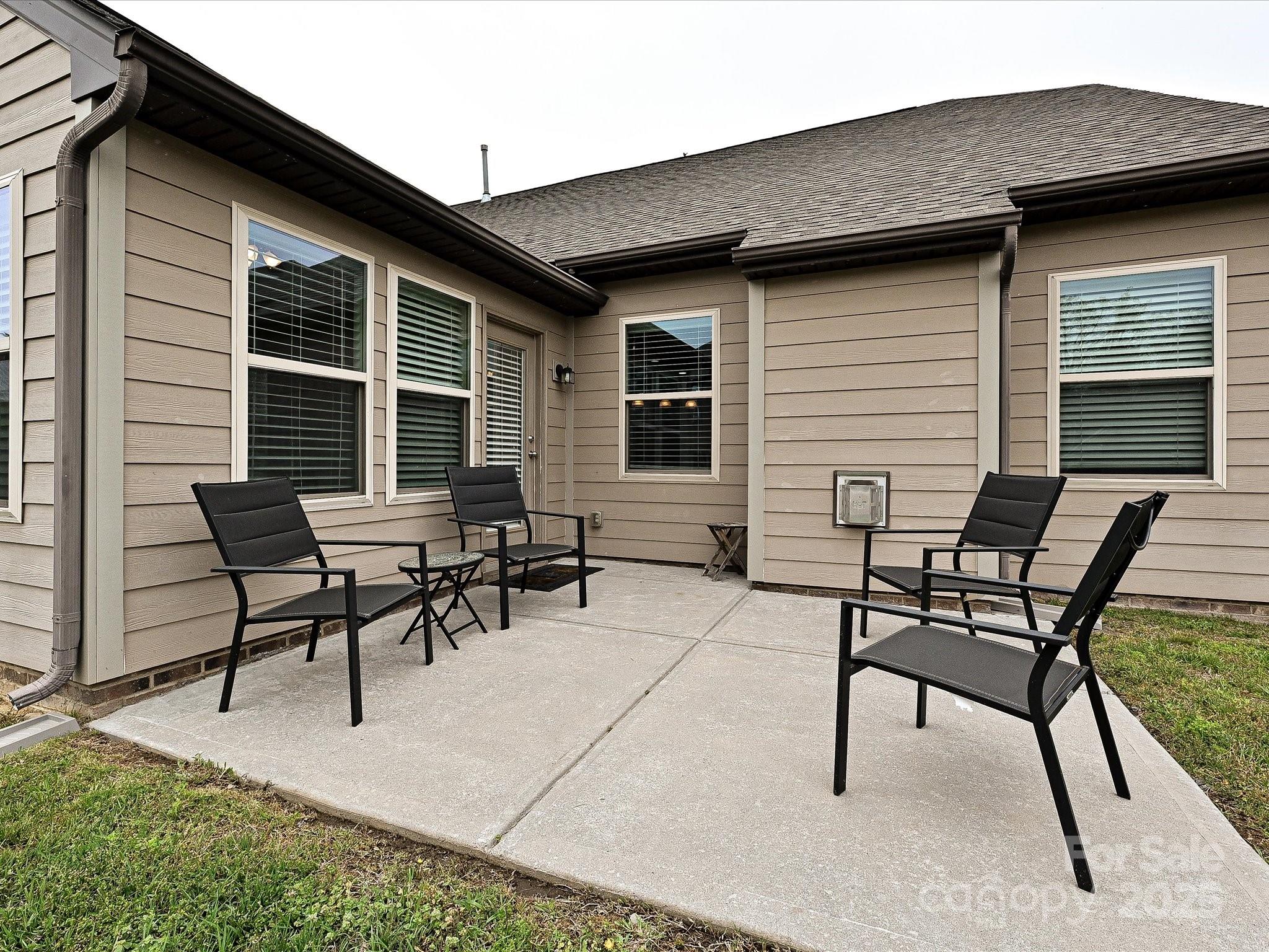 4425 Marlay Park Indian Trail, NC 28079 - Photo 29 of 33 a backyard of a house with table and chairs