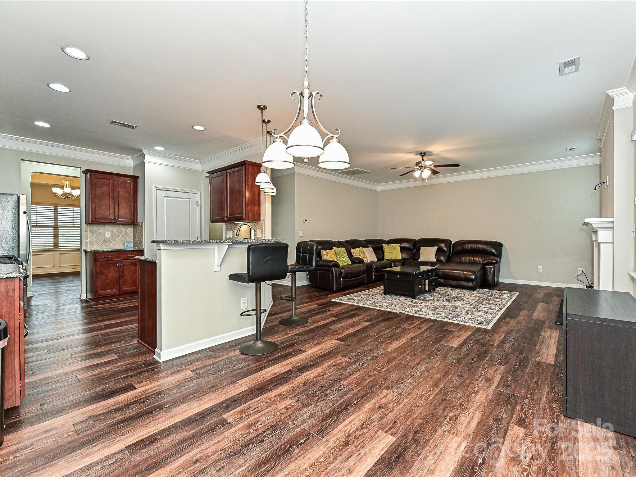 4425 Marlay Park Indian Trail, NC 28079 - Photo 7 of 33 a large kitchen with a table and chairs