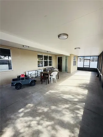 a view of a livingroom with furniture and a livingroom