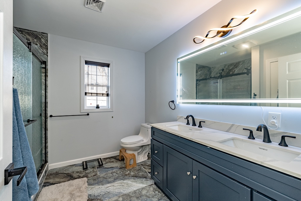 42 Ringgold Street Springfield, MA 01107 - Photo 9 of 13 a bathroom with a sink and a mirror