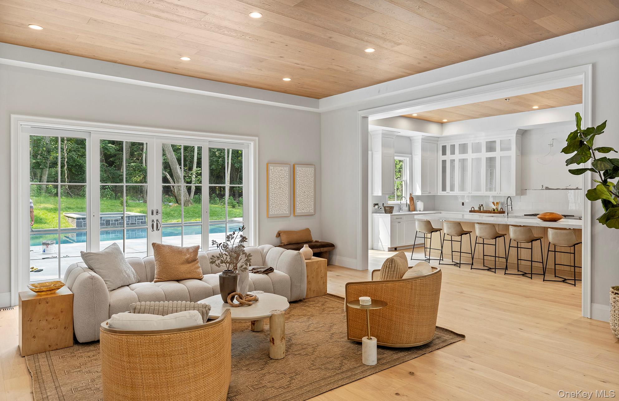 2524 Noyack Road Sag Harbor, NY 11963 - Photo 8 of 38 a living room with furniture and a large window