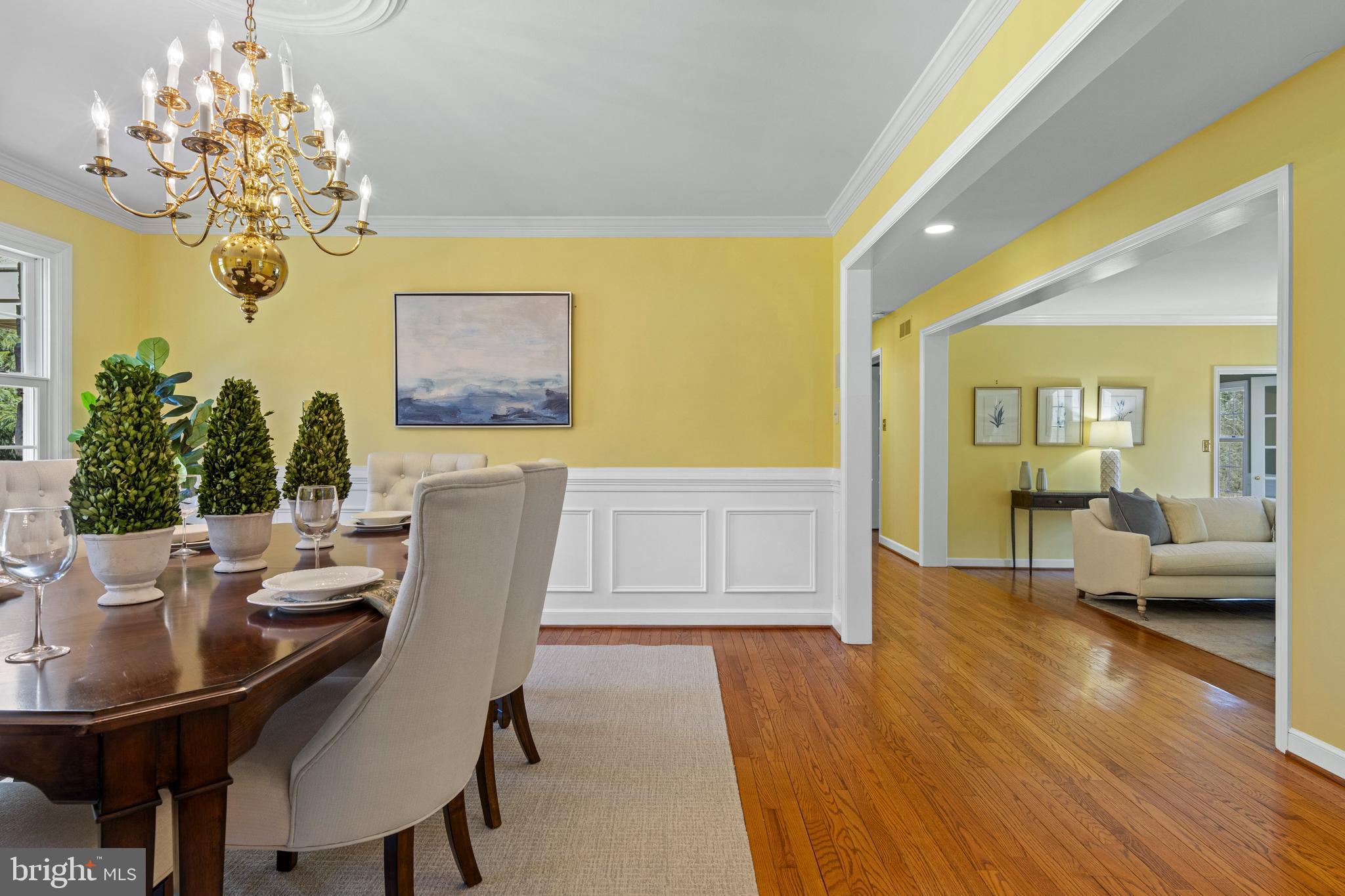 205 Ravenscliff Road Wayne, PA 19087 - Photo 15 of 65 a view of a dining room with furniture wooden floor and chandelier
