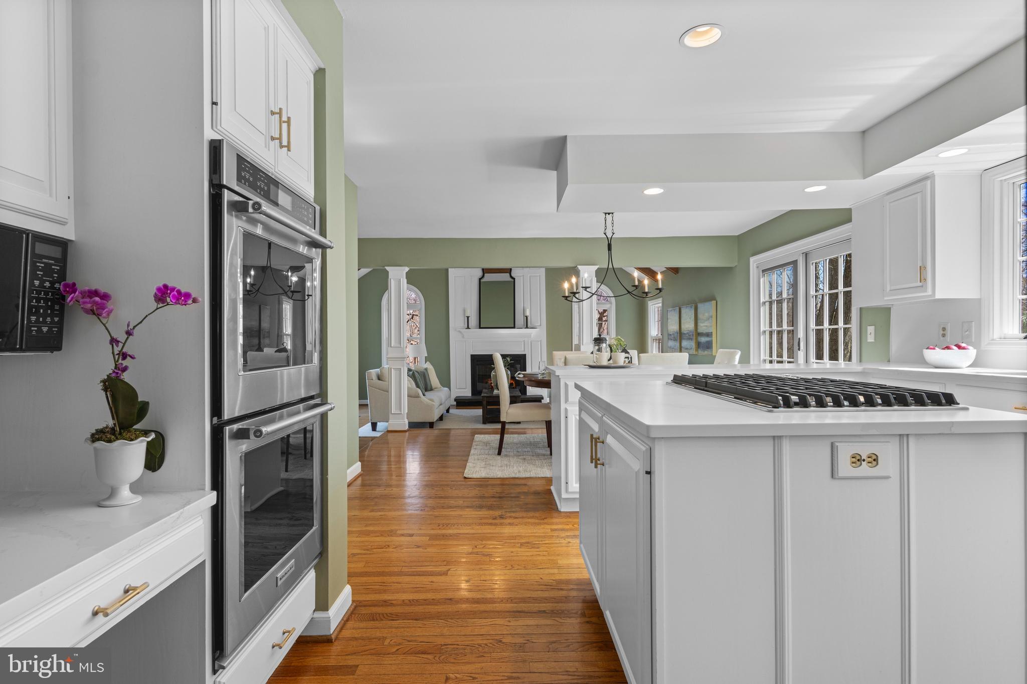 205 Ravenscliff Road Wayne, PA 19087 - Photo 18 of 65 a kitchen with kitchen island a sink stove and refrigerator