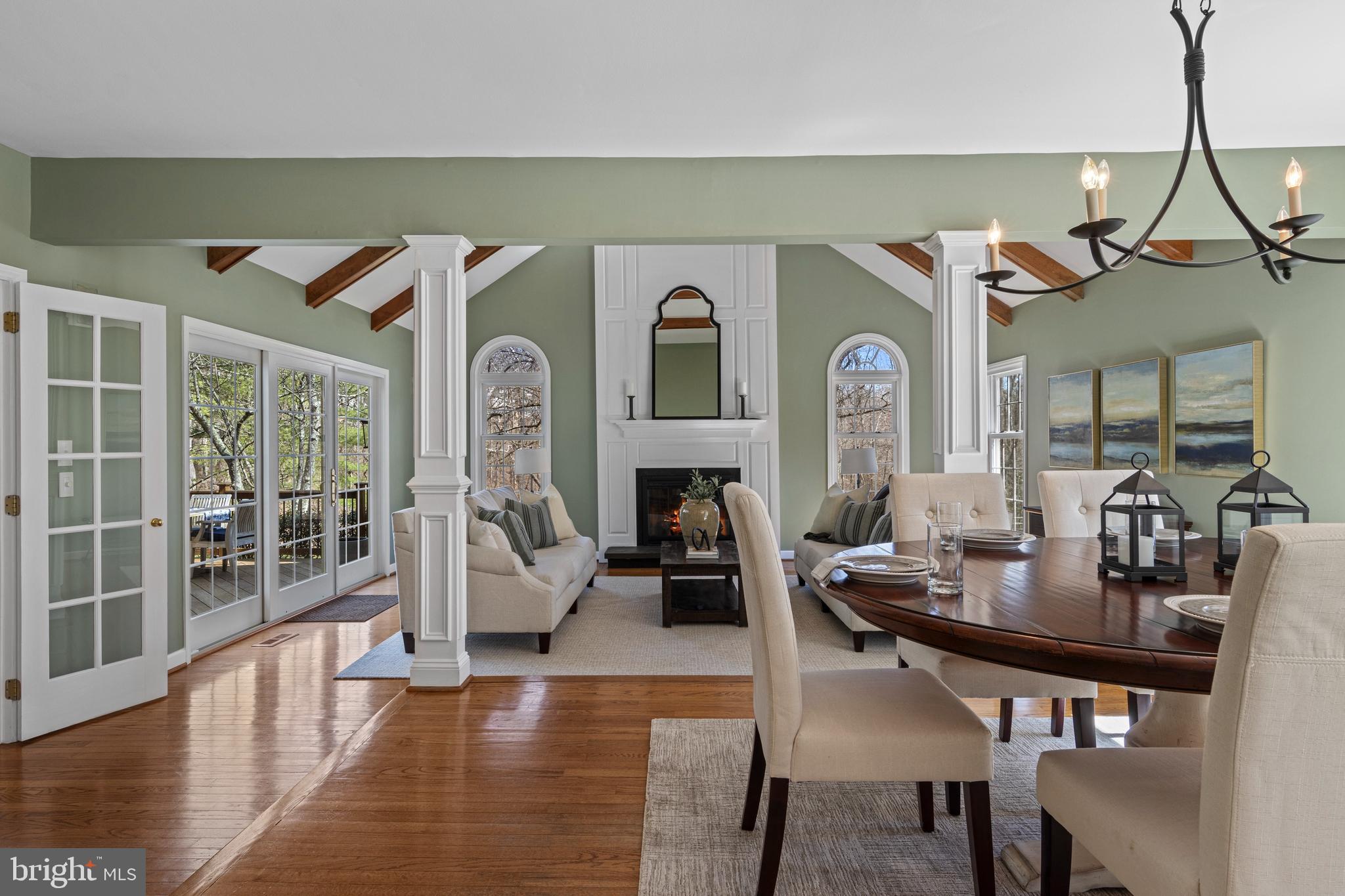 205 Ravenscliff Road Wayne, PA 19087 - Photo 25 of 65 a living room with fireplace furniture and a wooden floor