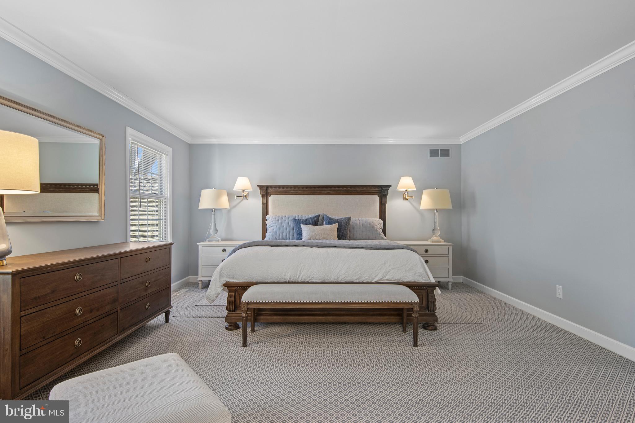 205 Ravenscliff Road Wayne, PA 19087 - Photo 35 of 65 a bedroom with a bed and window