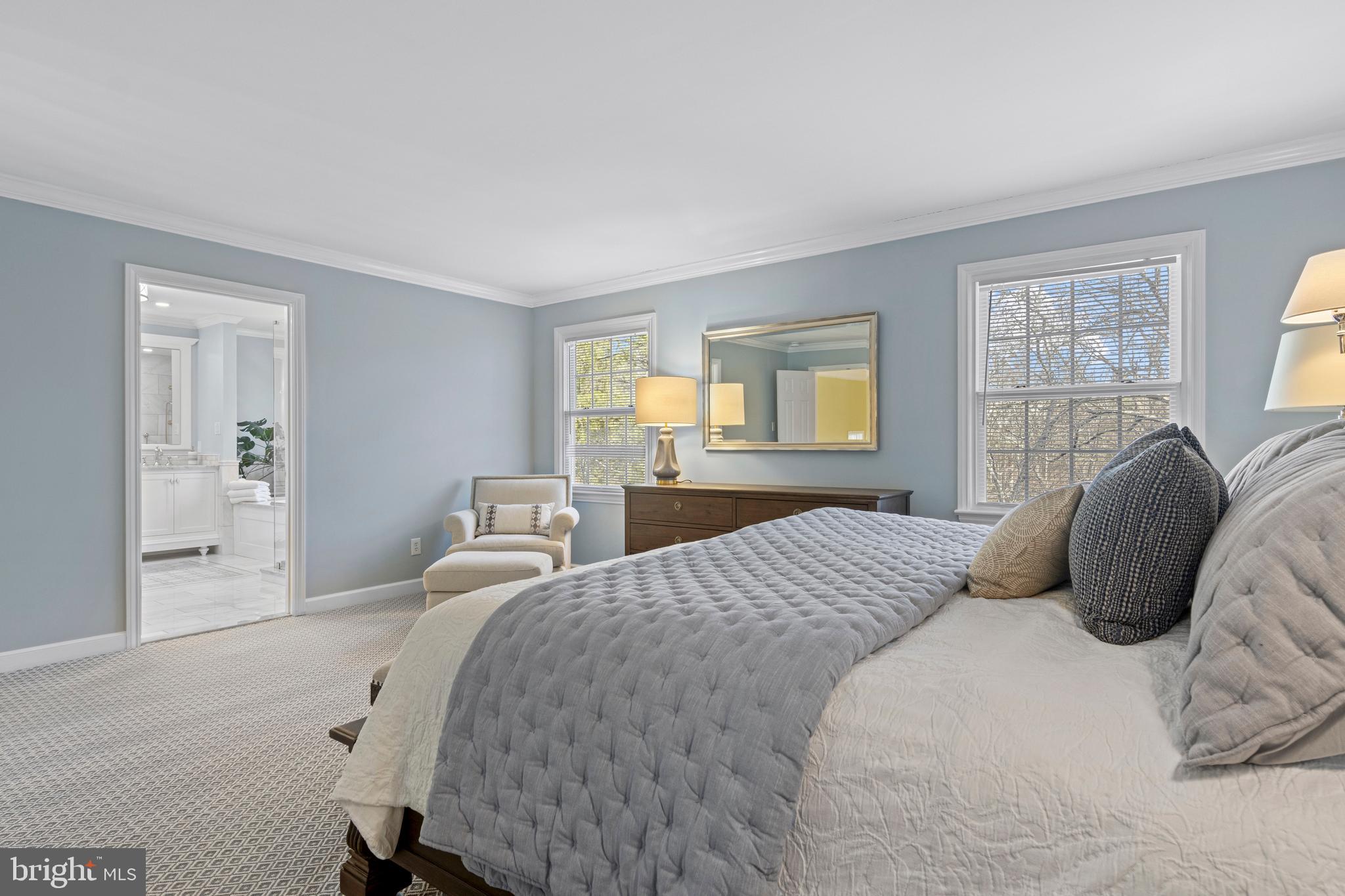 205 Ravenscliff Road Wayne, PA 19087 - Photo 36 of 65 a bedroom with a bed and wooden floor