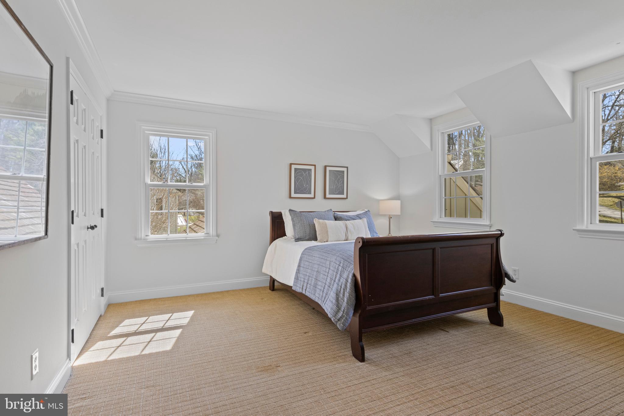 205 Ravenscliff Road Wayne, PA 19087 - Photo 44 of 65 a bedroom with a bed and a window