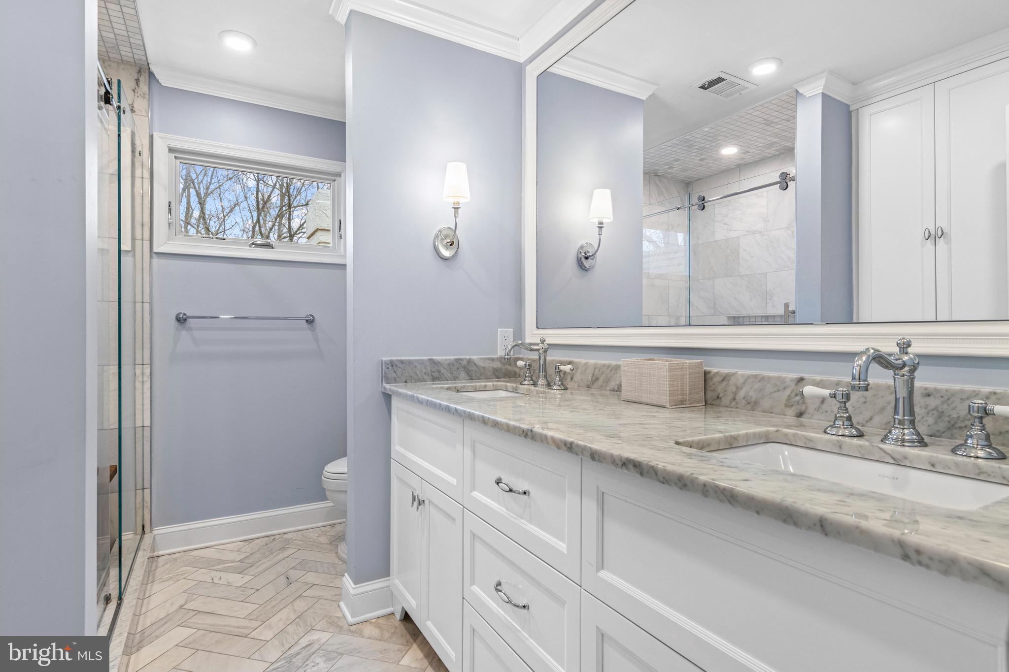 205 Ravenscliff Road Wayne, PA 19087 - Photo 47 of 65 a bathroom with a granite countertop sink mirror and double