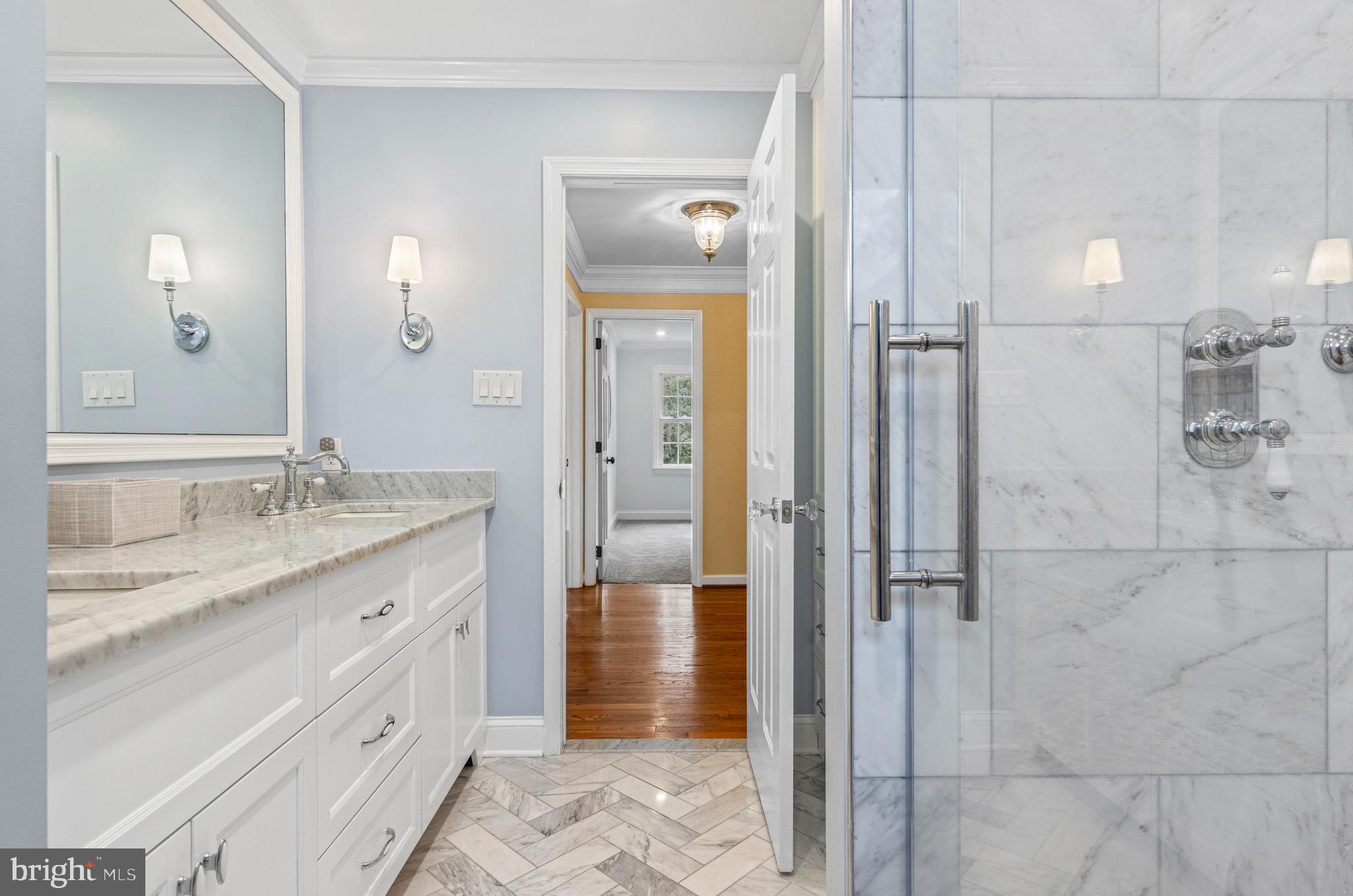 205 Ravenscliff Road Wayne, PA 19087 - Photo 49 of 65 a bathroom with a granite countertop sink mirror and shower