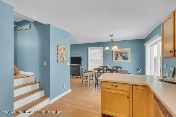 a workspace with furniture and stairs