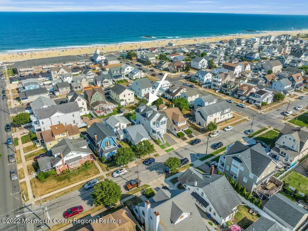 an aerial view of residential building with parking space