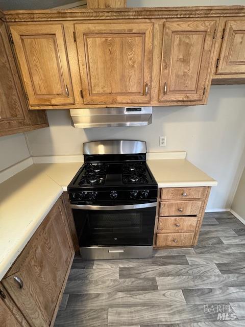3301 Buchanan Road, Unit 113 Antioch, CA 94509 - Photo 10 of 24 a kitchen with stainless steel appliances granite countertop a stove and a sink