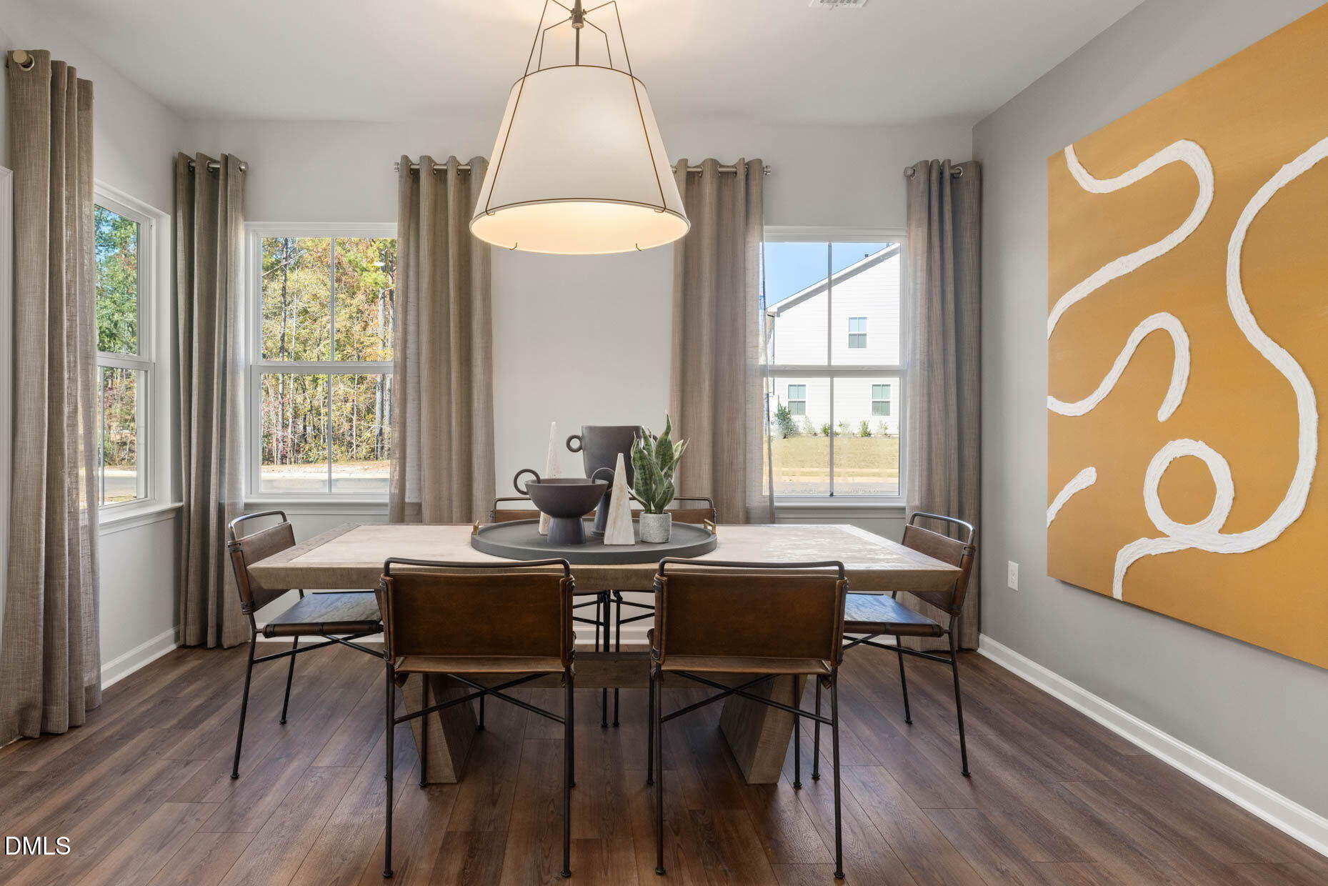 360 Broomside Avenue Raleigh, NC 27603 - Photo 10 of 35 a view of a dining room with furniture window and wooden floor
