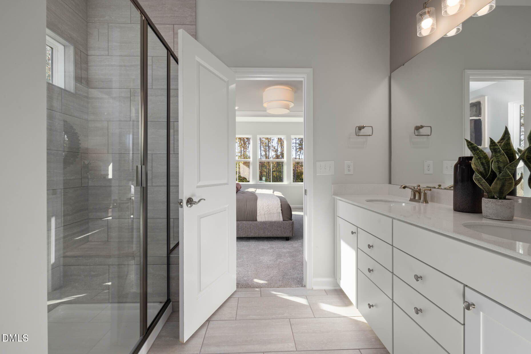 360 Broomside Avenue Raleigh, NC 27603 - Photo 14 of 35 a en suite bathroom with a granite countertop sink a mirror and a shower