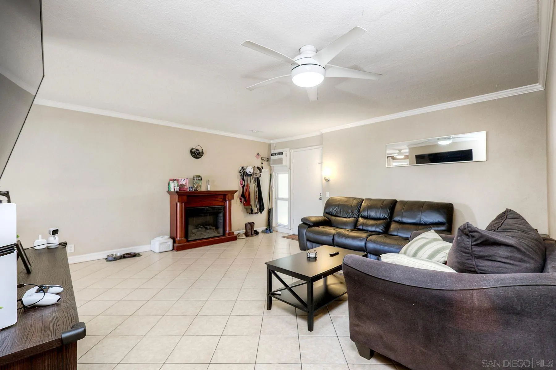 12923 Mapleview Street, Unit 6 Lakeside, CA 92040 - Photo 13 of 25 a living room with furniture and a fireplace