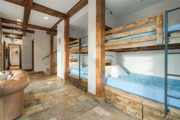 a bedroom with bed and window