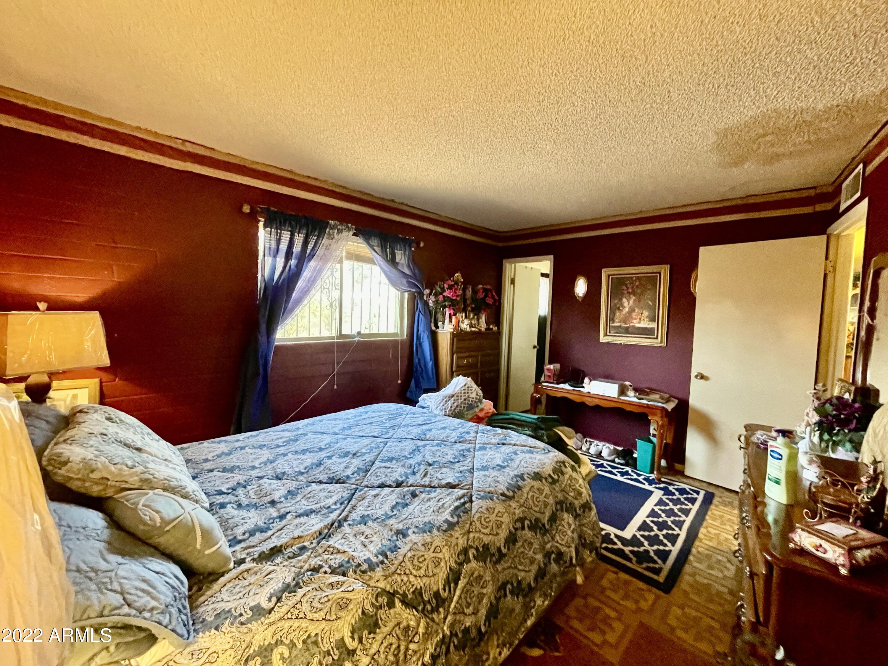 1713 West Vineyard Road Phoenix, AZ 85041 - Photo 7 of 21 Master Bedroom