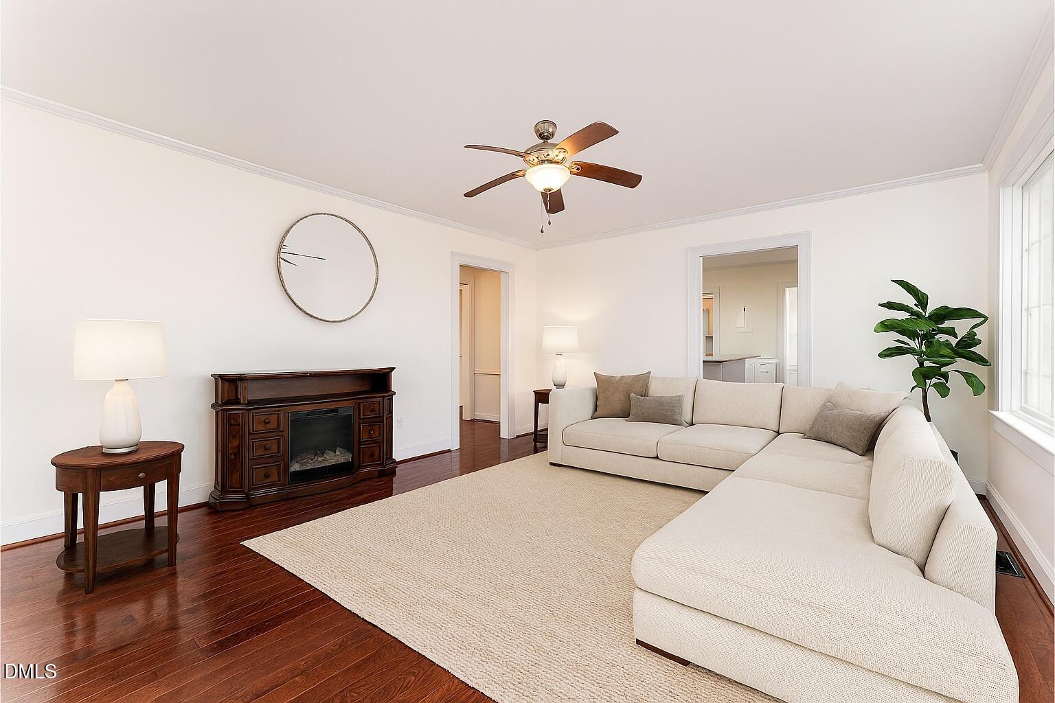 9670 Valley Road Middlesex, NC 27557 - Photo 11 of 22 a living room with furniture a fireplace and a potted plant