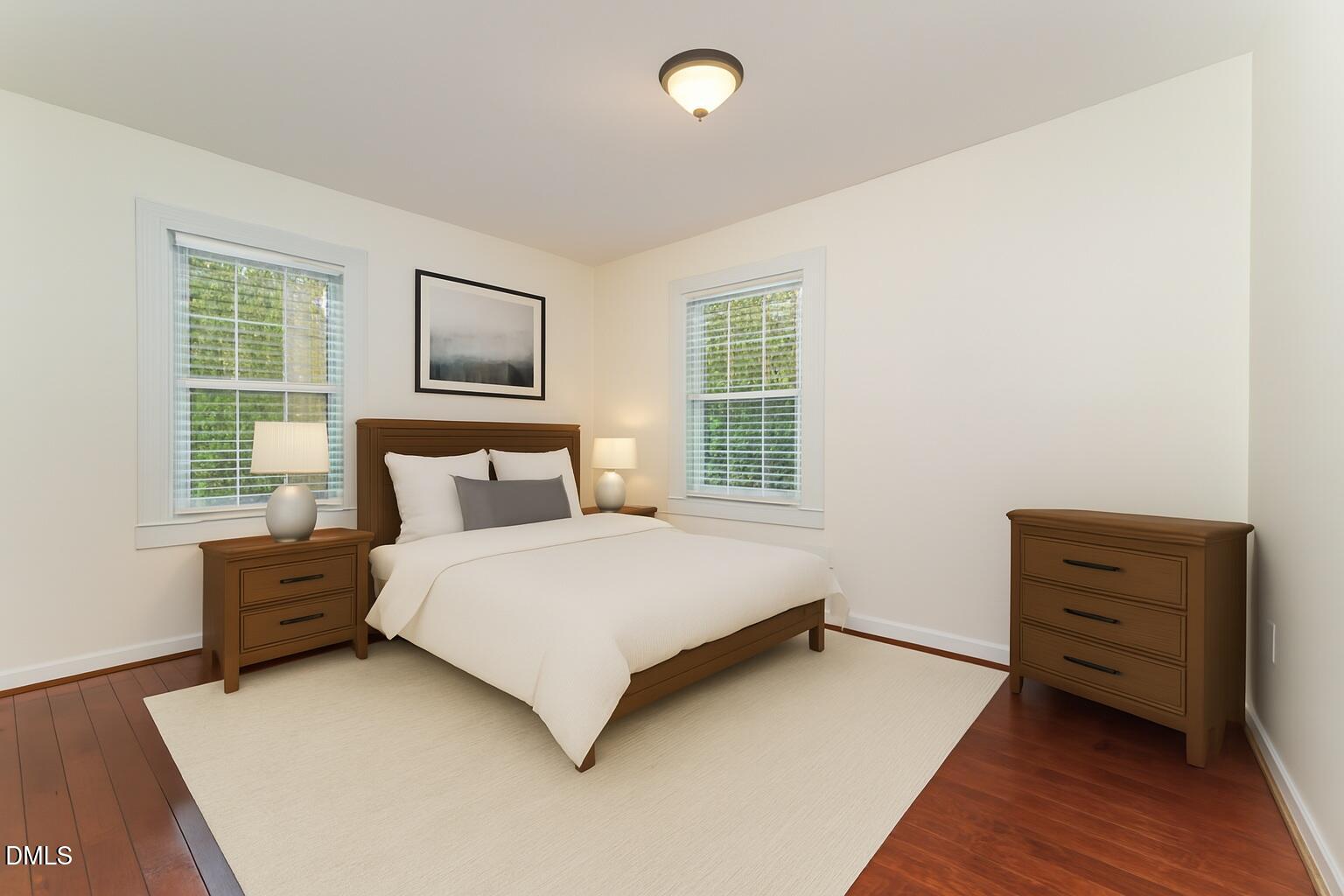 9670 Valley Road Middlesex, NC 27557 - Photo 17 of 22 a bedroom with a bed and a window