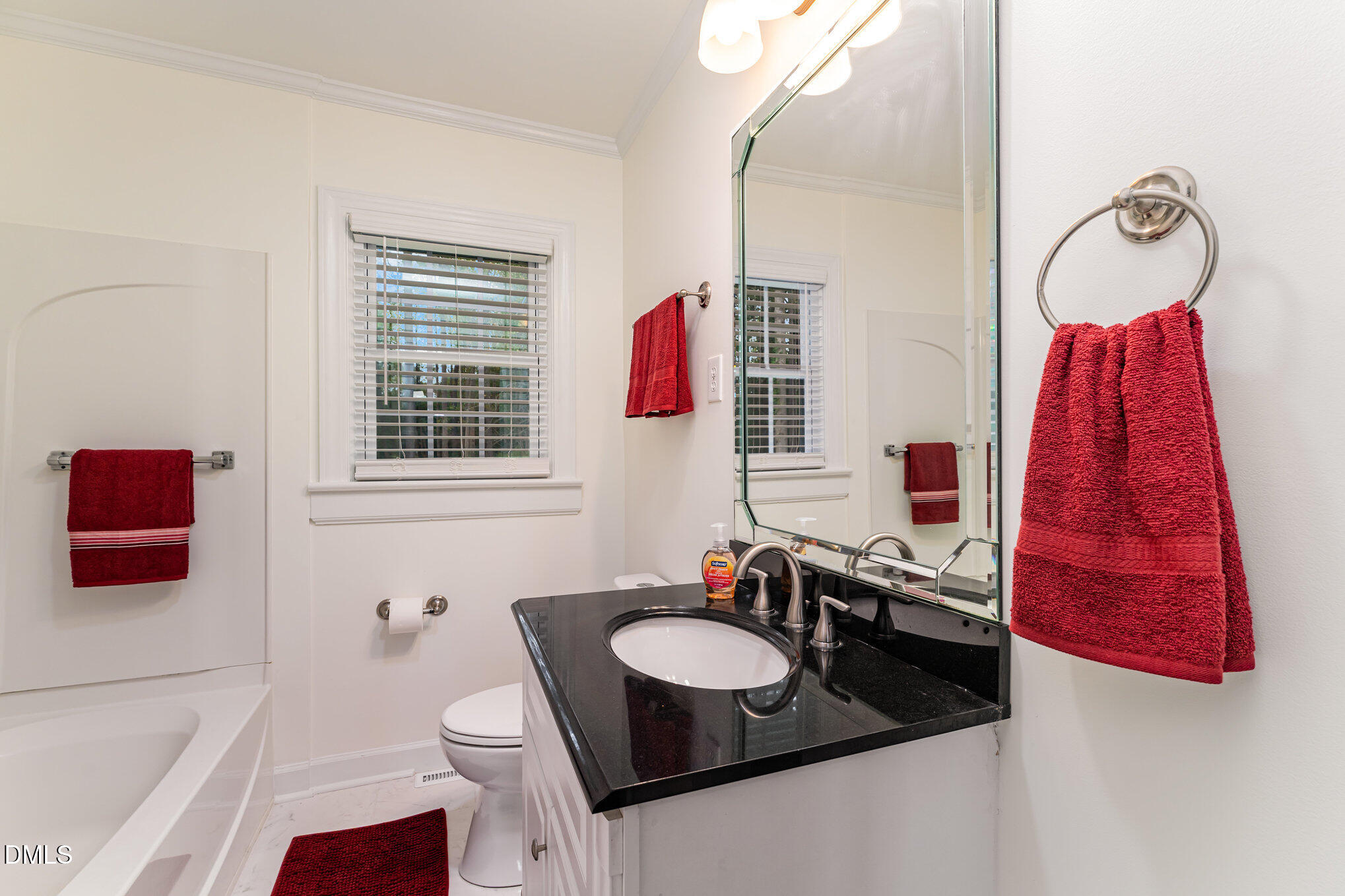 9670 Valley Road Middlesex, NC 27557 - Photo 20 of 22 a bathroom with a sink and a mirror