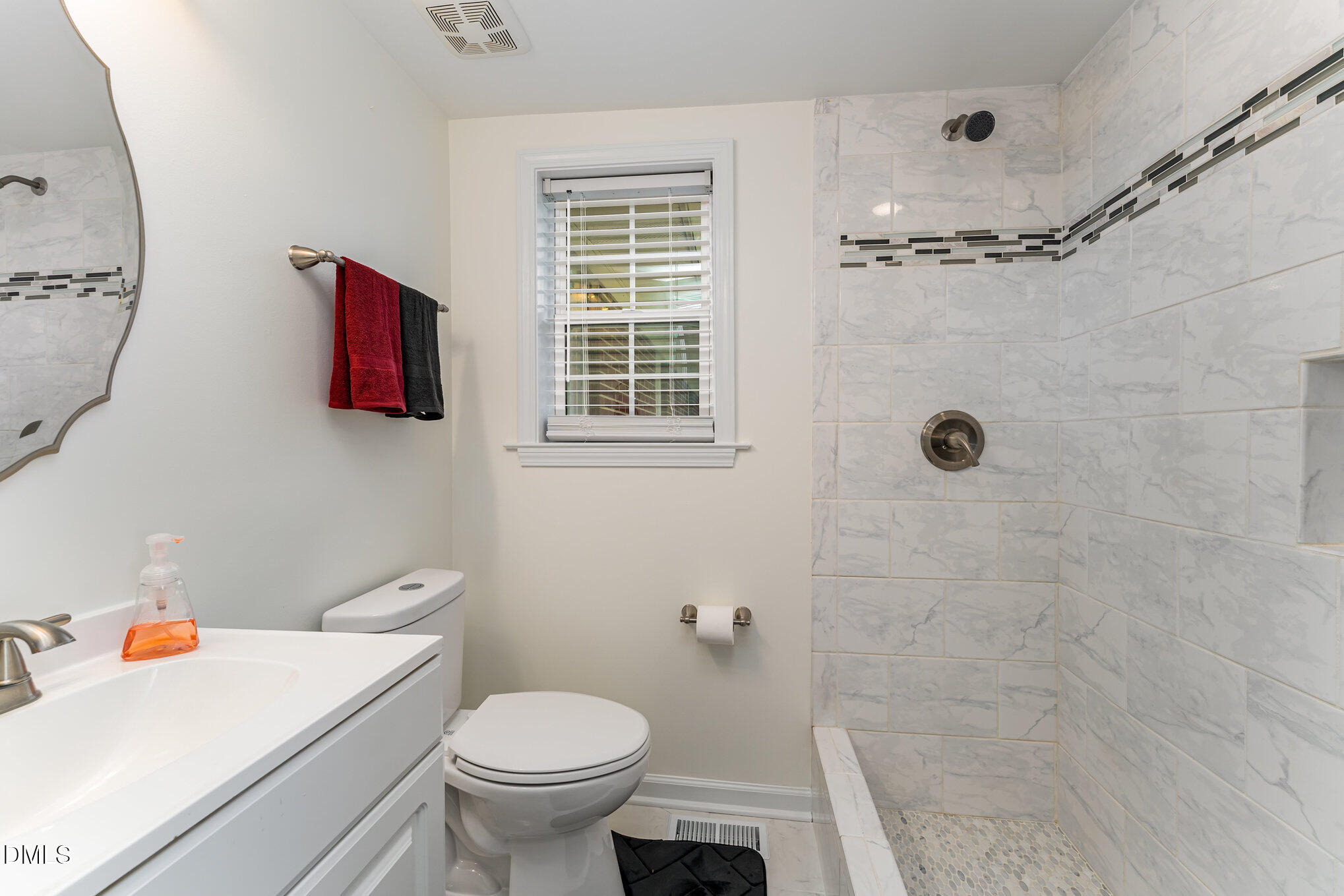 9670 Valley Road Middlesex, NC 27557 - Photo 21 of 22 a bathroom with a toilet and a shower