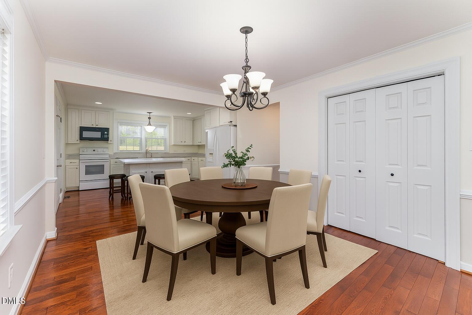 9670 Valley Road Middlesex, NC 27557 - Photo 7 of 22 a view of a dining room with furniture and wooden floor