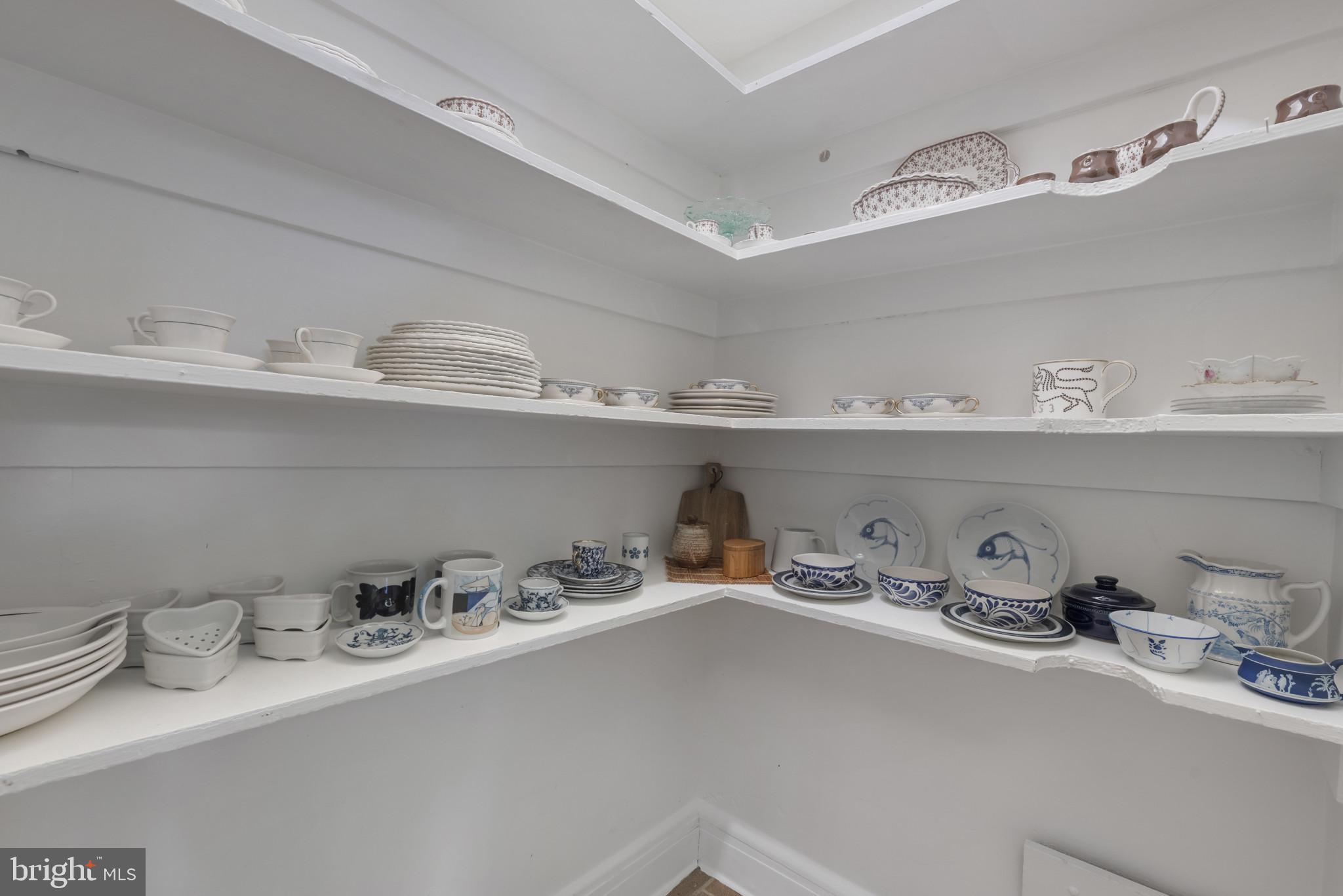 6 Upland Road, Unit F5 Baltimore, MD 21210 - Photo 14 of 31 a kitchen with a sink a stove and cabinets