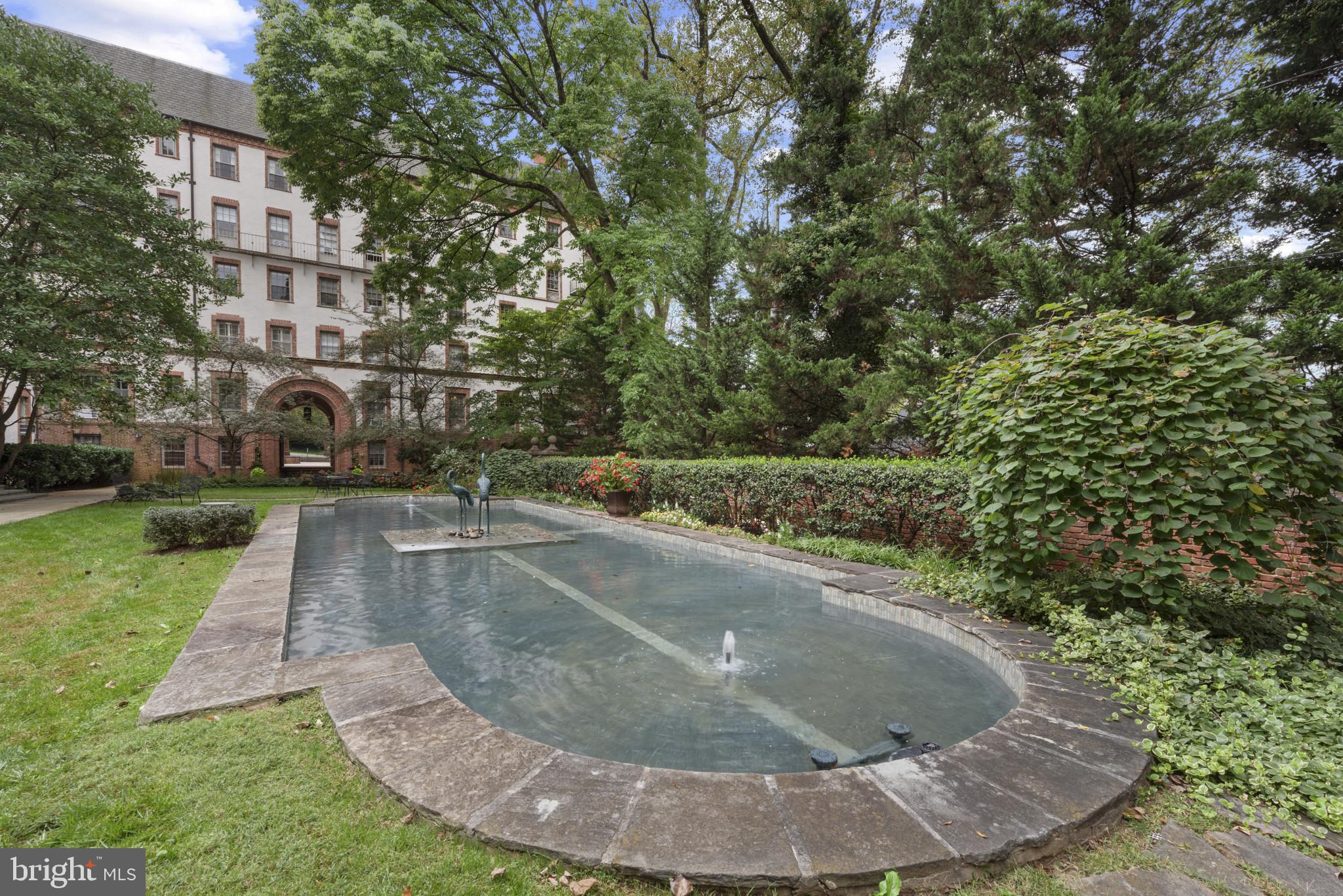6 Upland Road, Unit F5 Baltimore, MD 21210 - Photo 29 of 31 a view of a swimming pool with a yard