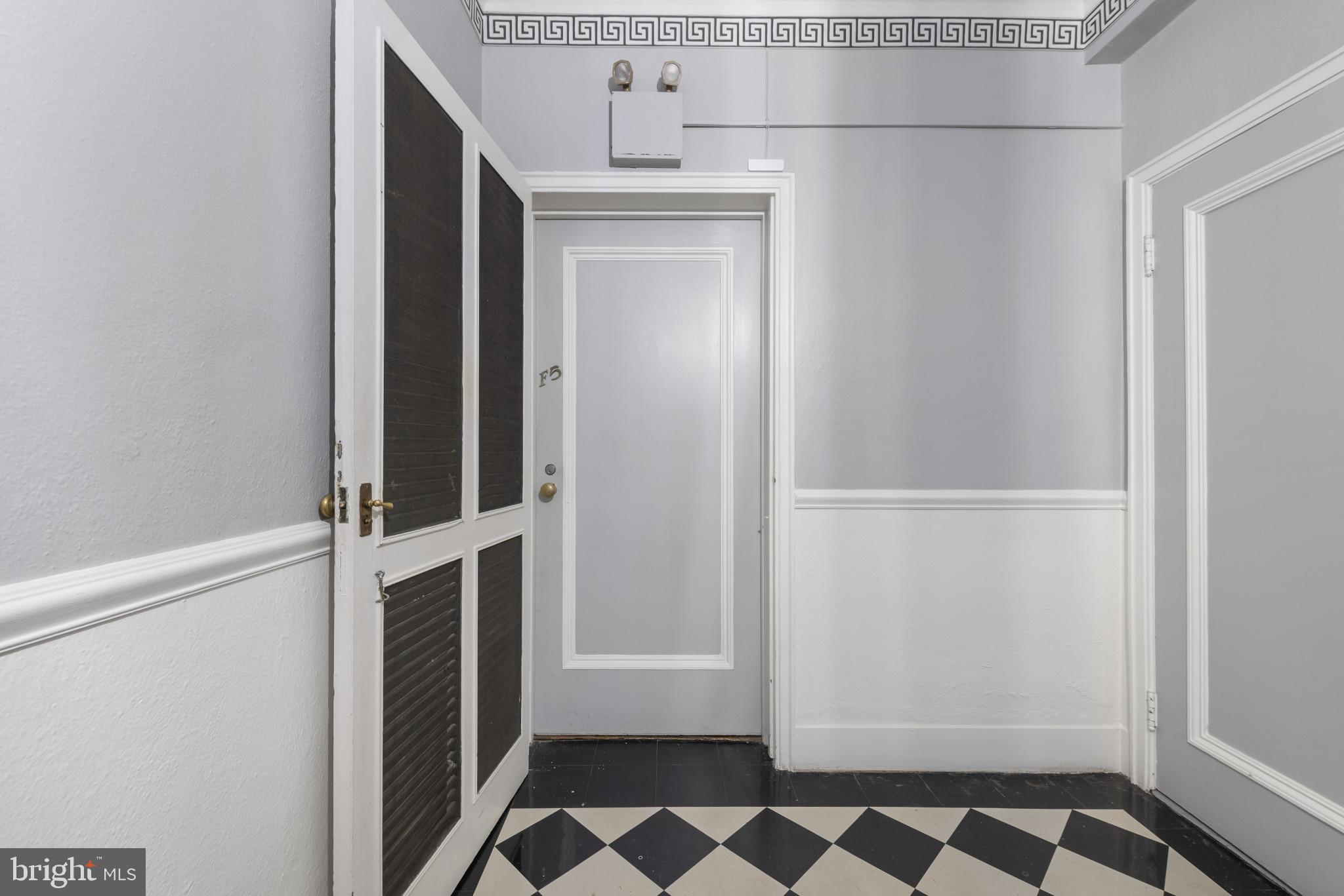 6 Upland Road, Unit F5 Baltimore, MD 21210 - Photo 3 of 31 a bathroom with a sink and a mirror