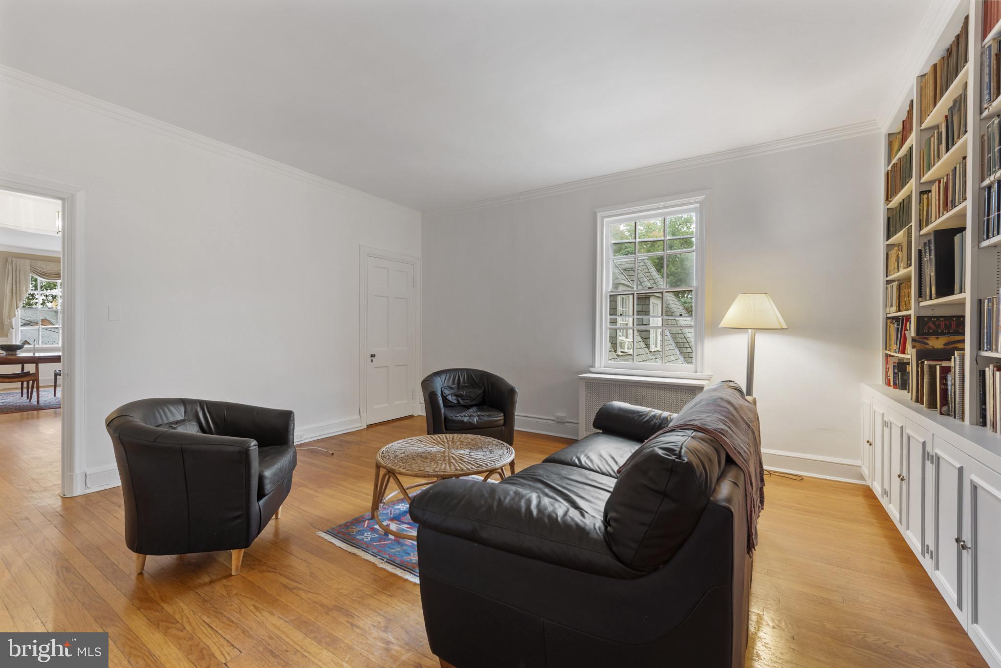 6 Upland Road, Unit F5 Baltimore, MD 21210 - Photo 7 of 31 a living room with furniture rug and window