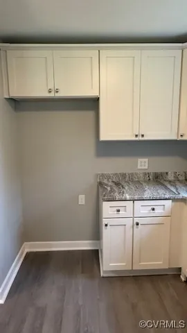 a view of cabinets with granite countertop cabinets