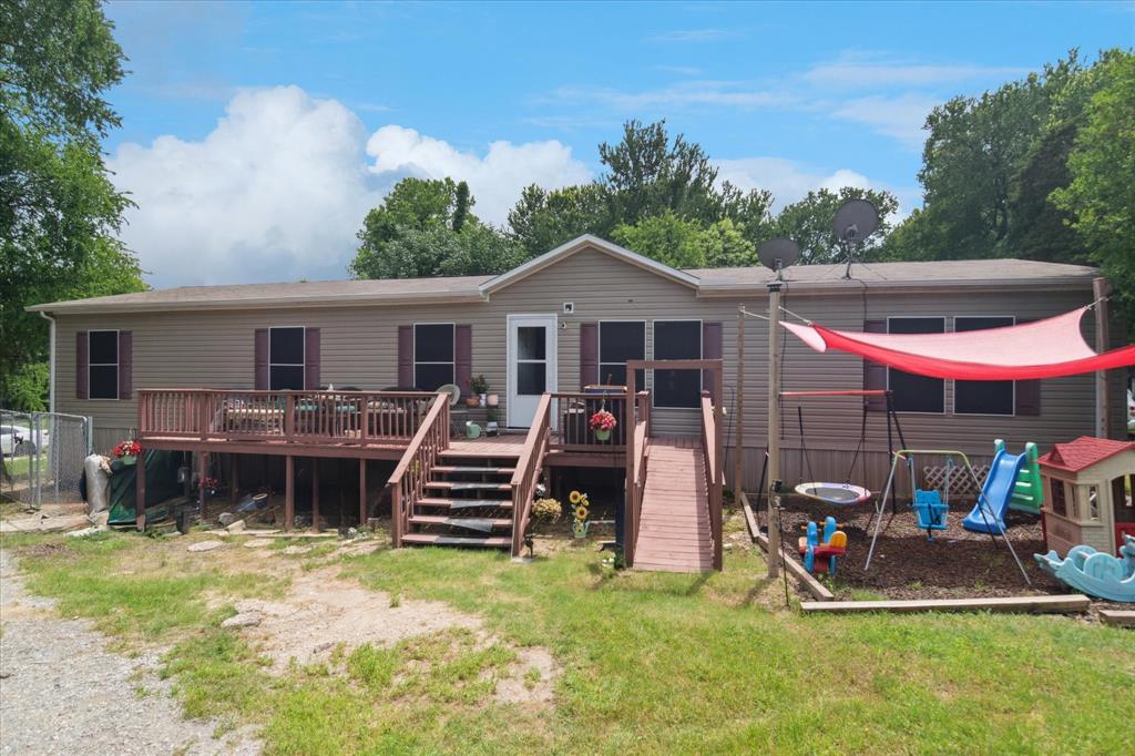 4804 Creekside Road Melissa, TX 75454 - Photo 2 of 17 a view of a patio with a table and chairs