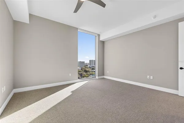 a bathroom with a sink a vanity and a mirror