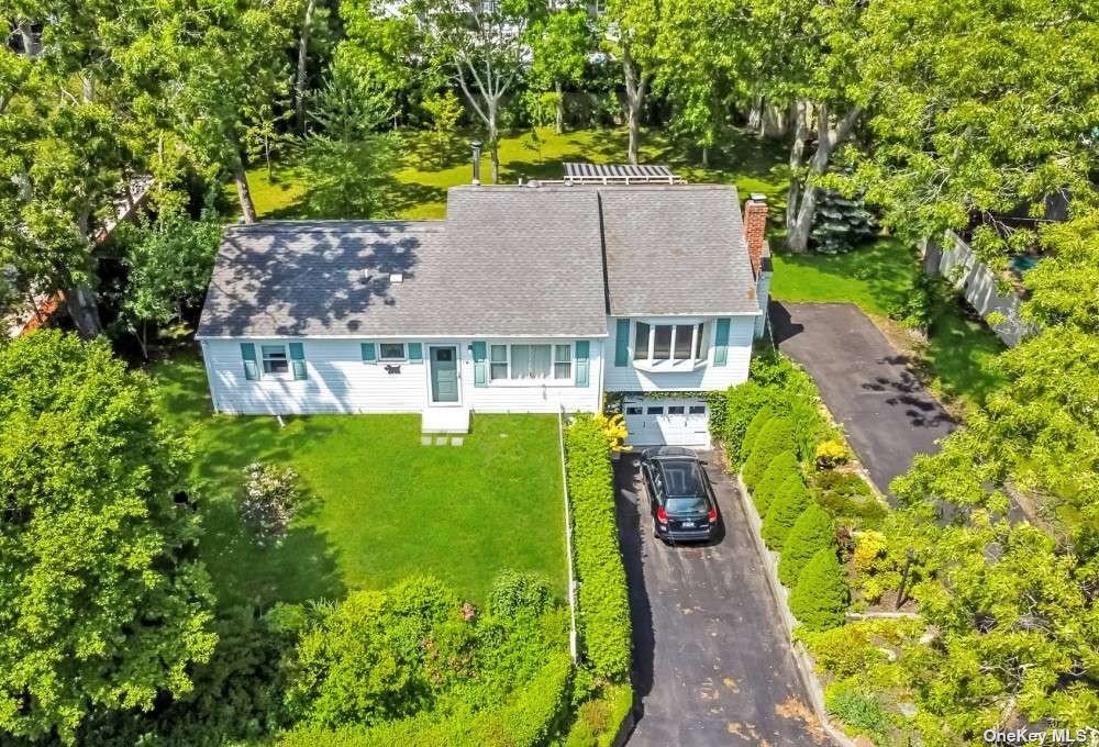 a aerial view of a house with garden