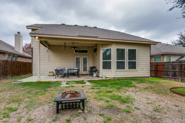 a backyard of a house with seating space
