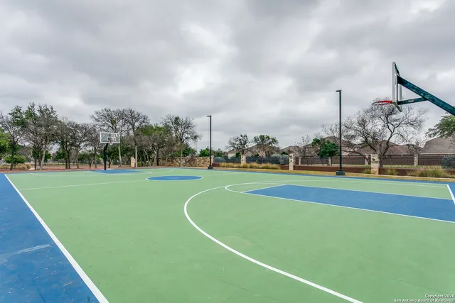 a view of a golf course with a lake