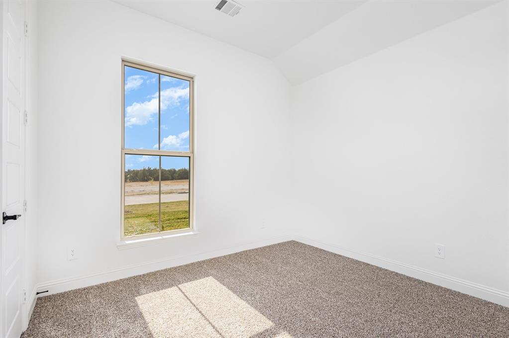 6841 Hayes Road Midlothian, TX 76065 - Photo 18 of 27 an empty room with windows