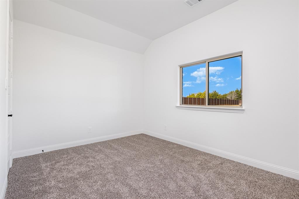 6841 Hayes Road Midlothian, TX 76065 - Photo 21 of 27 an empty room with a window