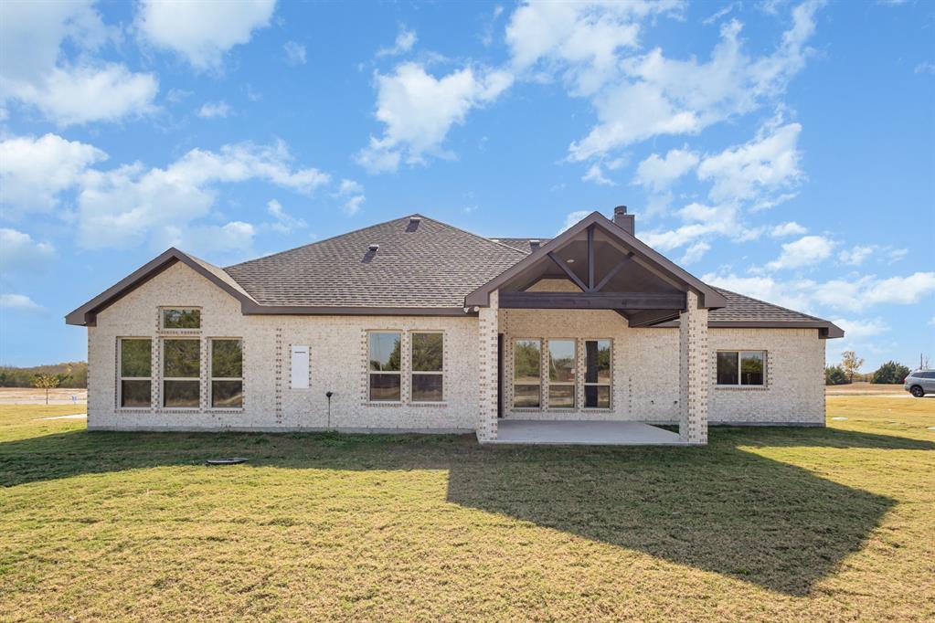 6841 Hayes Road Midlothian, TX 76065 - Photo 27 of 27 a view of a house with a yard
