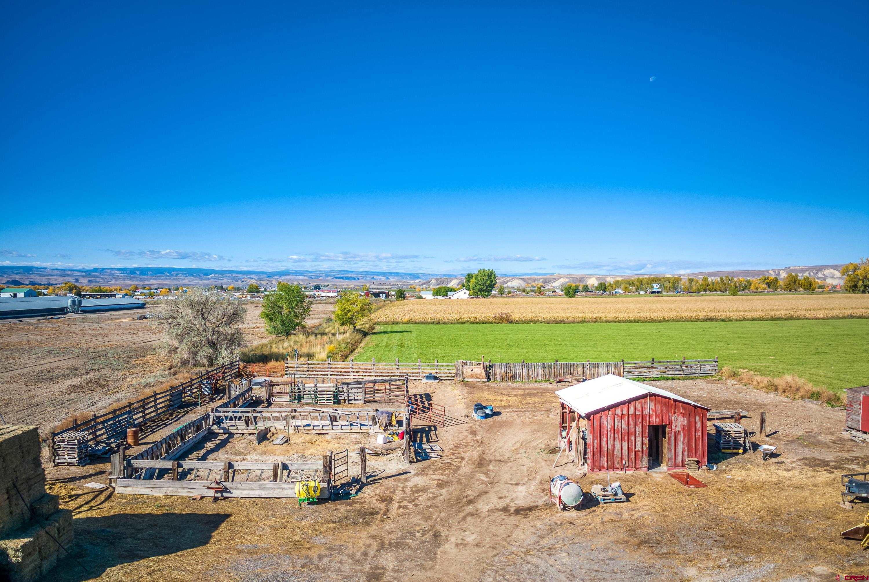 1449 Highway 50 Delta, CO 81416 - Photo 17 of 37 an aerial view of a house with a lake view