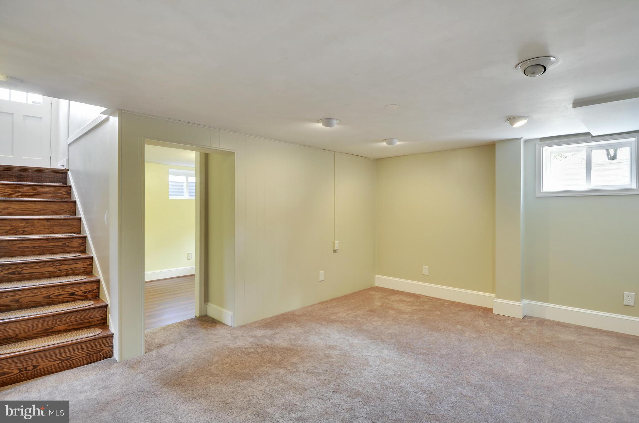 10005 Sutherland Road Silver Spring, MD 20901 - Photo 22 of 30 a view of an empty room with a window