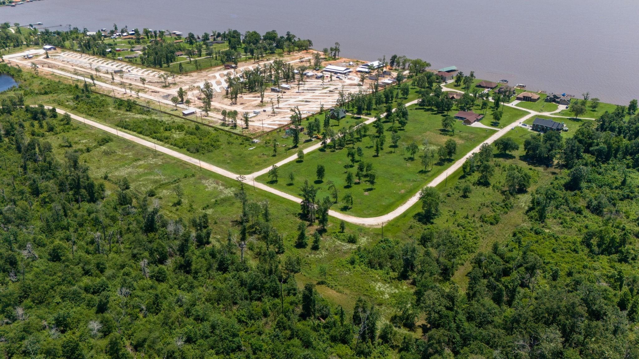 32 Falcon Point Onalaska, TX 77360 - Photo 7 of 10 an aerial view of a residential houses with outdoor space and street view