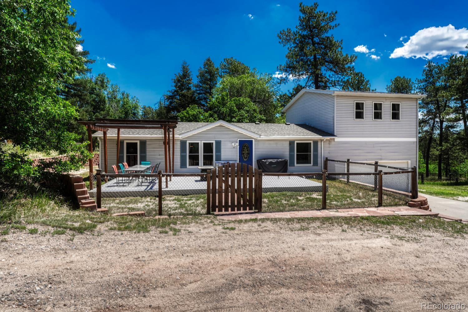 9306 South Curtis Road Larkspur, CO 80118 - Photo 1 of 50