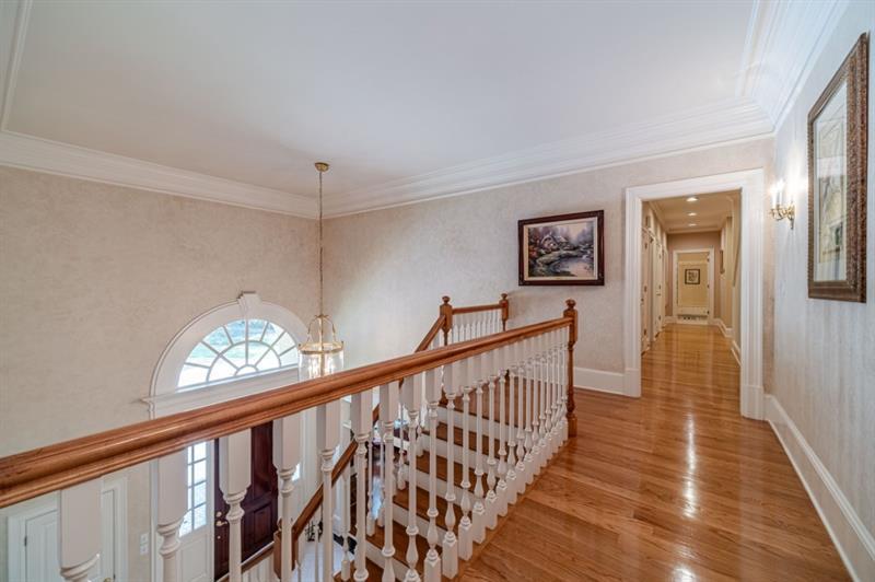 200 Johnson Road Suwanee, GA 30024 - Photo 27 of 71 a view of entryway with wooden floor
