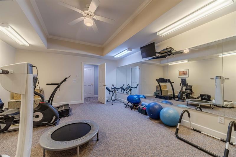 200 Johnson Road Suwanee, GA 30024 - Photo 51 of 71 a view of a room with gym equipment