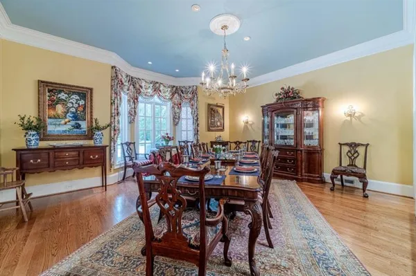 a kitchen with a stove a sink and a refrigerator