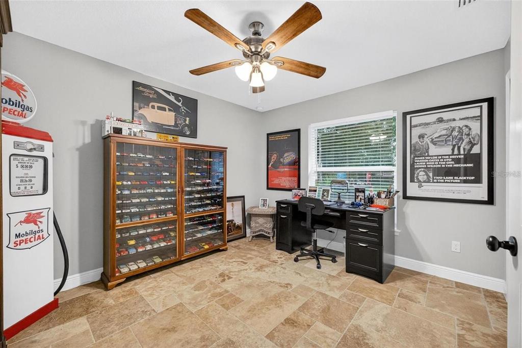 8160 Southeast 164th Place Summerfield, FL 34491 - Photo 37 of 56 a view of a workspace with furniture and a window