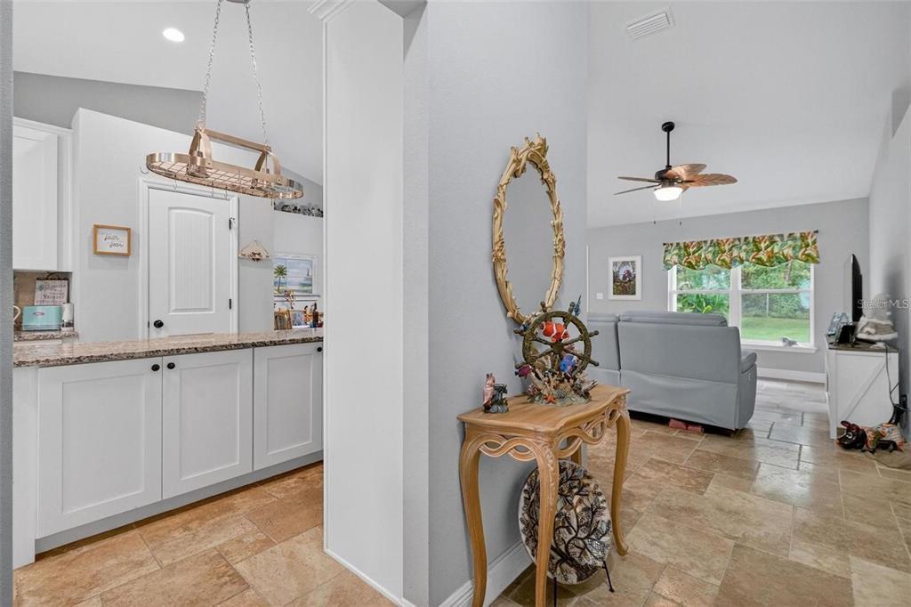 8160 Southeast 164th Place Summerfield, FL 34491 - Photo 4 of 56 a living room with furniture and a large window