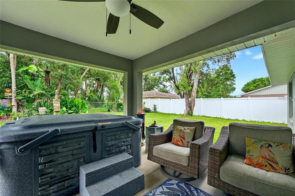 8160 Southeast 164th Place Summerfield, FL 34491 - Photo 42 of 56 a outdoor living space with furniture and garden view